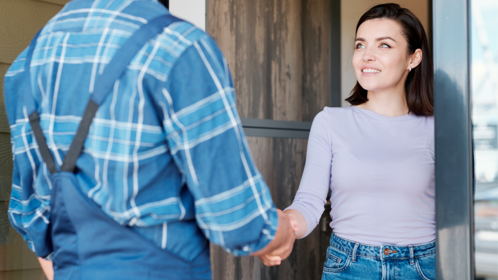 AC Maintenance Technician Warmly Greeting Homeowner